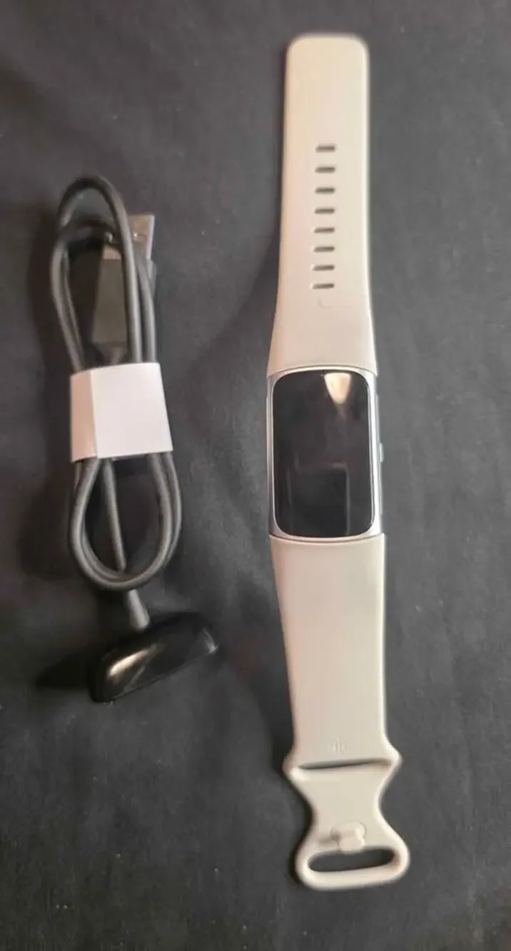 Fitbit Charge6 Fitness Tracker with Google Apps Heart Rate on Exercise Equipment